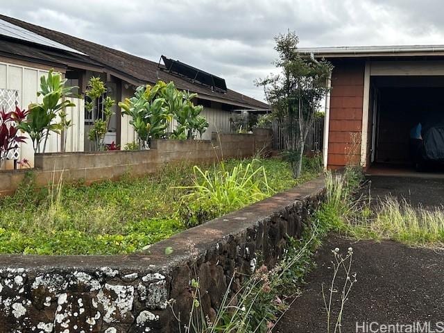 view of side of property featuring a garage