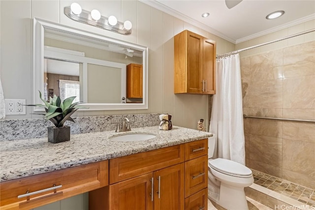 bathroom featuring a shower with curtain, ornamental molding, toilet, and vanity