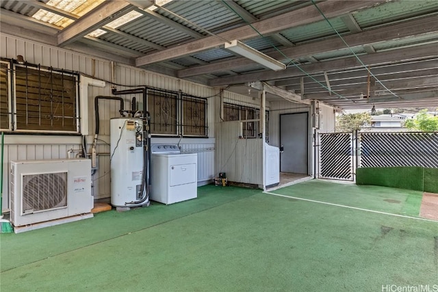 miscellaneous room featuring washer / clothes dryer, water heater, and ac unit