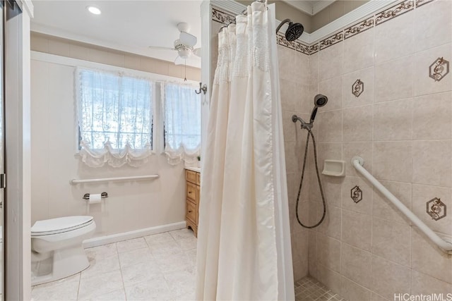 bathroom featuring tile patterned flooring, vanity, walk in shower, ceiling fan, and toilet