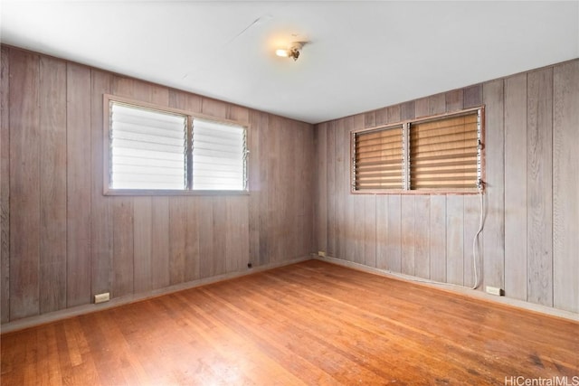 unfurnished room featuring light wood-type flooring