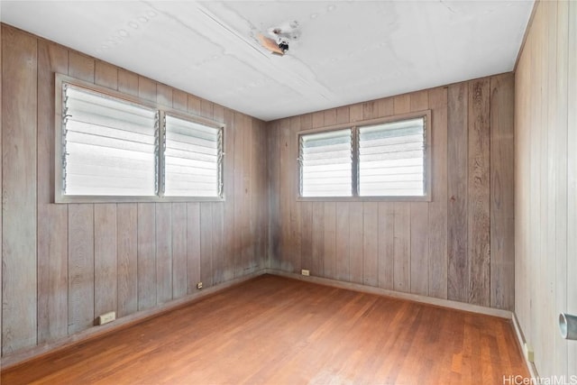 spare room with light hardwood / wood-style floors