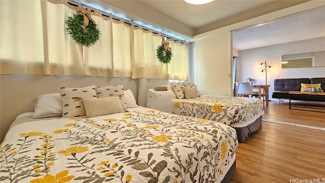 bedroom featuring hardwood / wood-style flooring