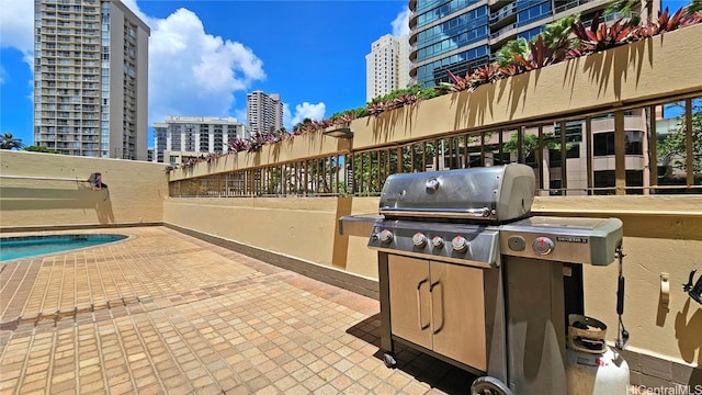 view of patio featuring a pool