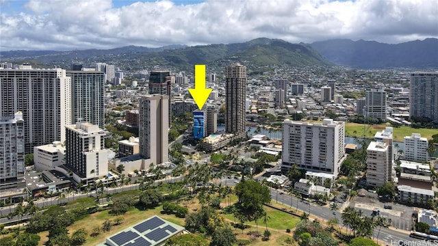 drone / aerial view featuring a mountain view