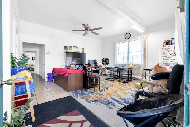 tiled living room with ceiling fan