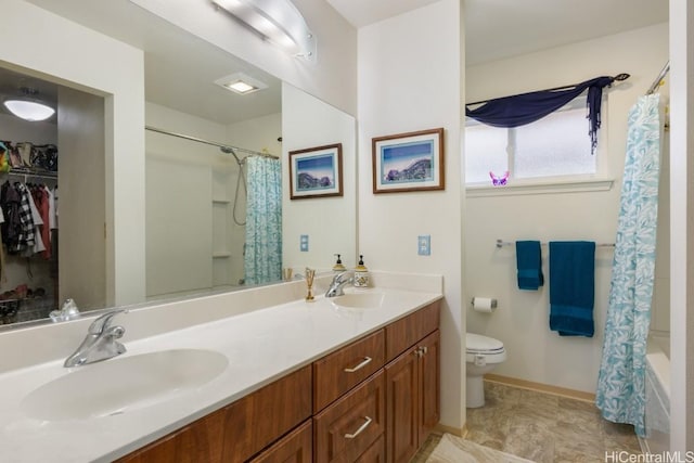 full bathroom featuring vanity, toilet, and shower / bathtub combination with curtain