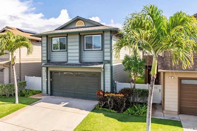 view of front of home with a garage