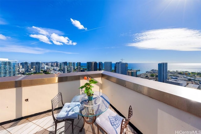 balcony featuring a water view