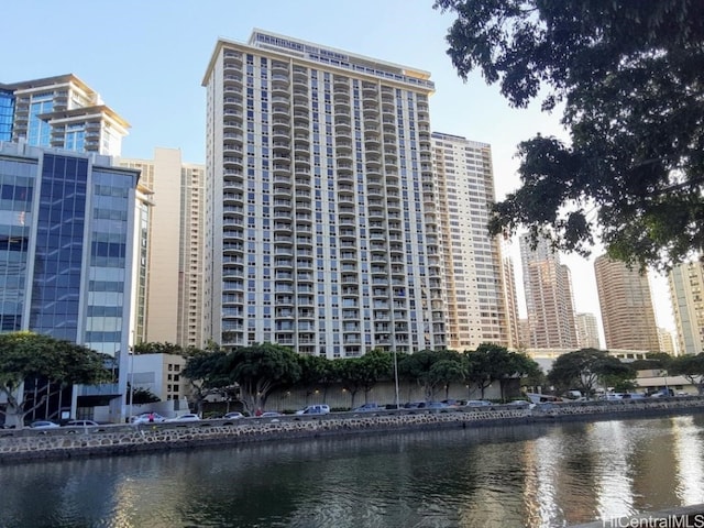 view of building exterior featuring a water view