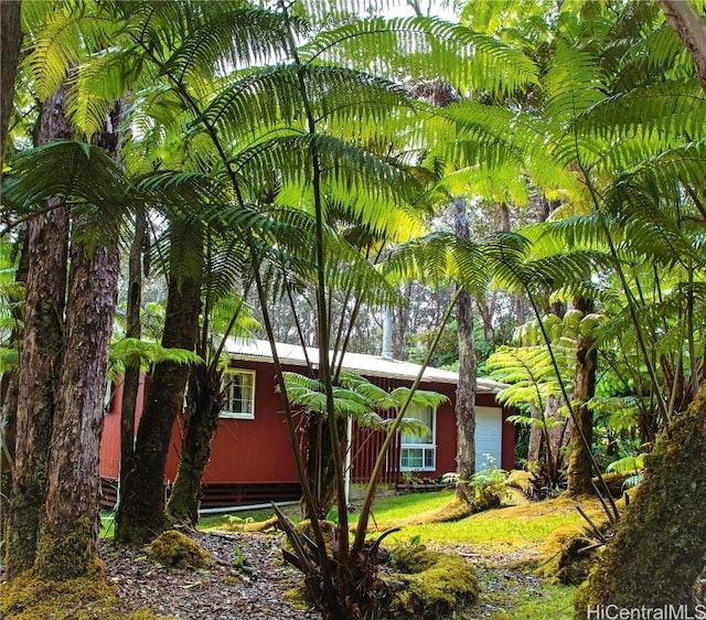 view of home's exterior with a garage