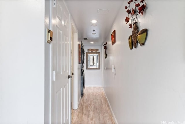 hallway featuring light hardwood / wood-style flooring