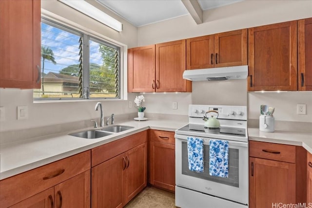 kitchen featuring sink, electric range, and light tile patterned floors