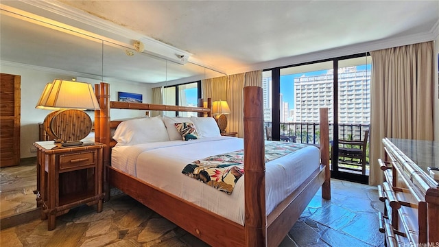 2425 Kuhio Ave Unit 1104, Honolulu, HI 96815 - bedroom featuring a city view, stone tile flooring, crown molding, and a wall mounted AC