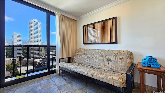 2425 Kuhio Ave Unit 1104, Honolulu, HI 96815 - sitting room featuring a healthy amount of sunlight, a view of city, and crown molding