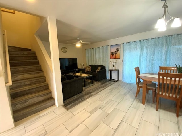 dining space featuring ceiling fan