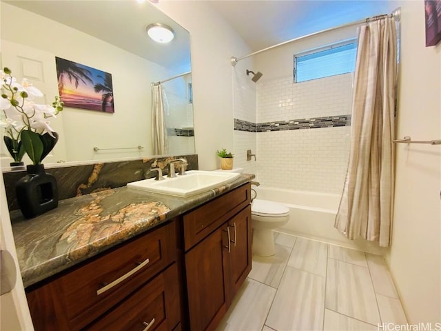 full bathroom with vanity, toilet, and shower / bath combo