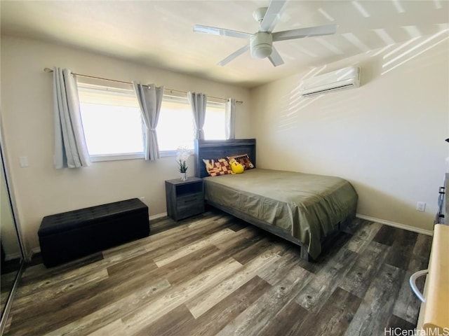 bedroom featuring ceiling fan, a wall mounted air conditioner, and dark hardwood / wood-style flooring