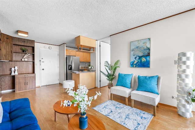 775 Kinalau Pl Unit 1907, Honolulu, HI 96813 - living area with light wood-style flooring and a textured ceiling