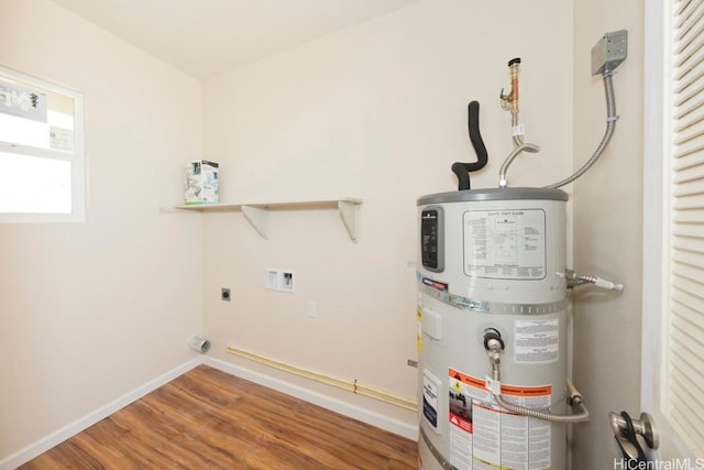 utility room with strapped water heater