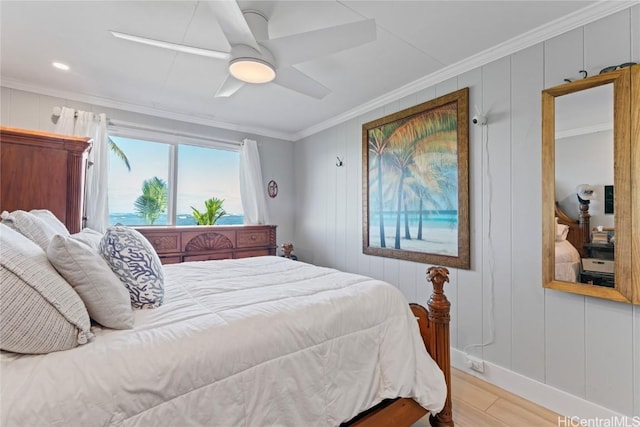 bedroom with crown molding, ceiling fan, and light wood-type flooring