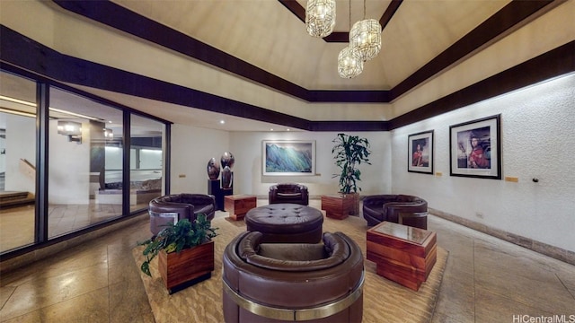 living room featuring an inviting chandelier