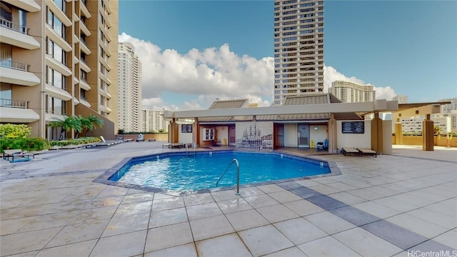 view of pool with a patio