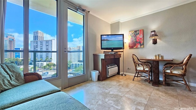 living room featuring crown molding