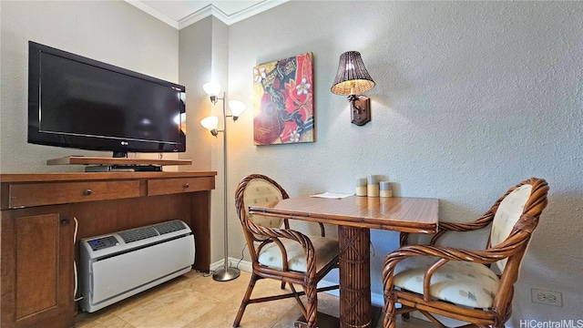 dining area featuring crown molding