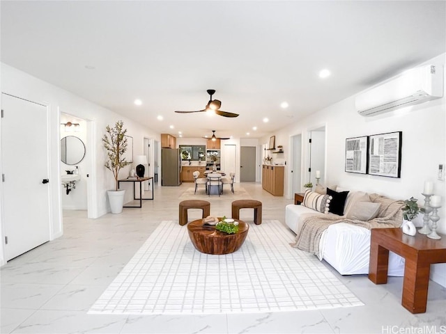 living room featuring an AC wall unit and ceiling fan