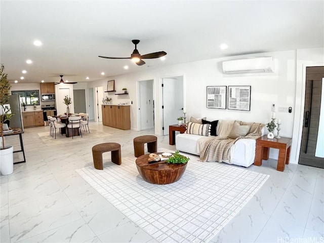 living room with ceiling fan and a wall unit AC