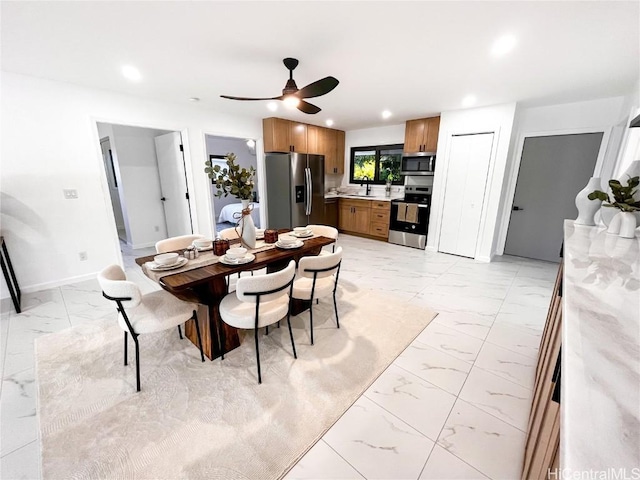 dining area featuring ceiling fan