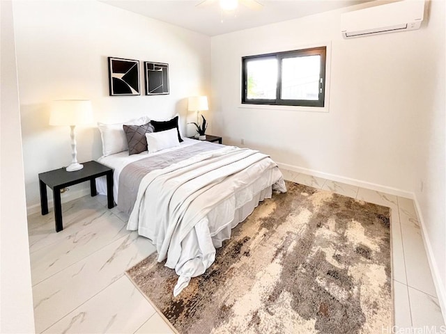 bedroom with ceiling fan and a wall mounted air conditioner