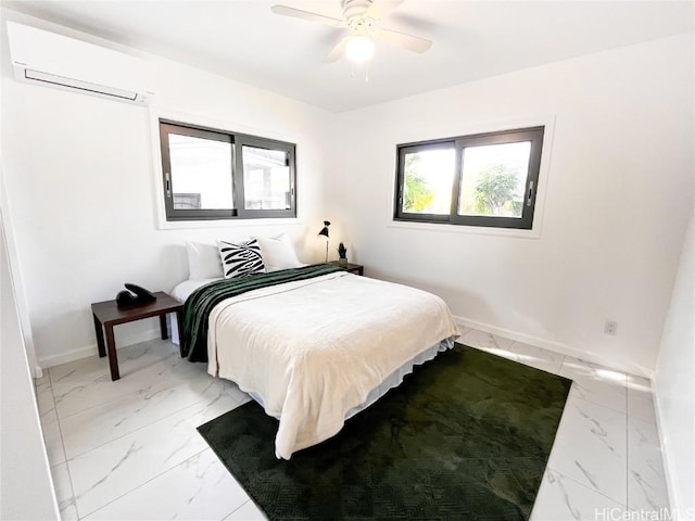 bedroom featuring ceiling fan and a wall mounted AC