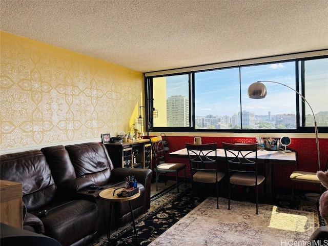 living room featuring a textured ceiling