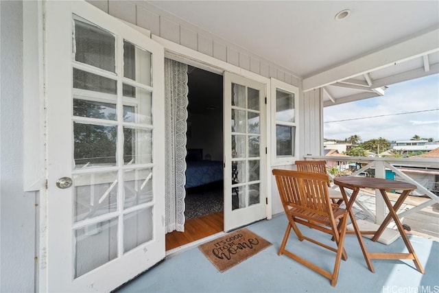 sunroom featuring french doors