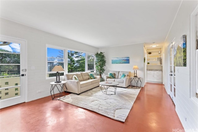 living room with concrete flooring