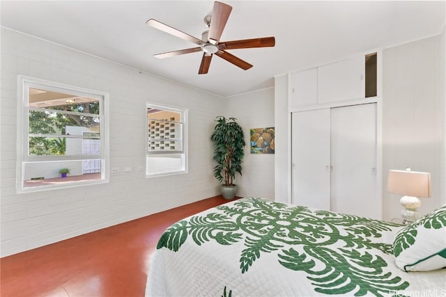 bedroom with a closet and ceiling fan