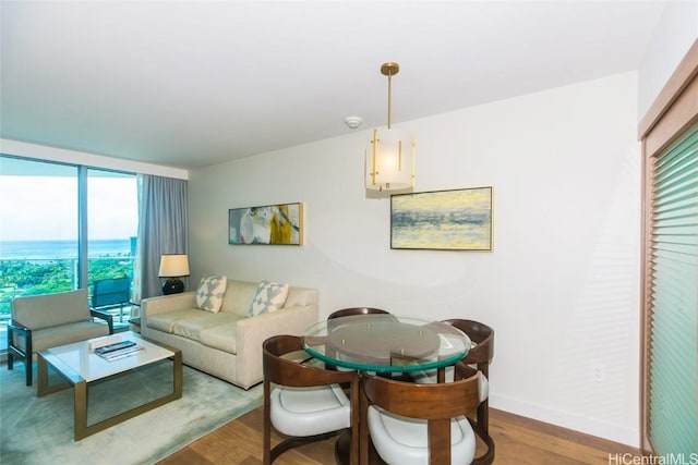 2139 Kuhio Ave Unit 1810, Honolulu, HI 96815 - living room featuring wood finished floors and baseboards