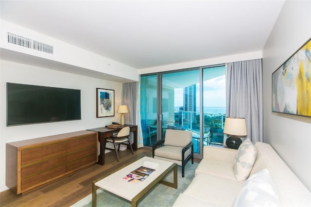 2139 Kuhio Ave Unit 1810, Honolulu, HI 96815 - living room featuring wood finished floors