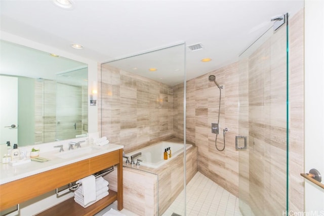 2139 Kuhio Ave Unit 1810, Honolulu, HI 96815 - bathroom featuring a bath, vanity, a shower stall, recessed lighting, and tile patterned floors