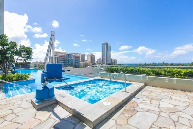 2139 Kuhio Ave Unit 1810, Honolulu, HI 96815 - community pool with a community hot tub and a view of city