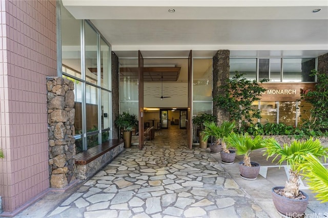 property entrance featuring a patio