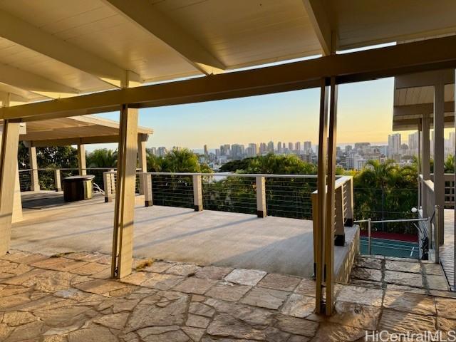 view of patio terrace at dusk