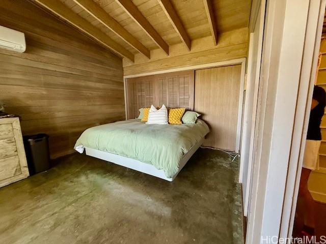 bedroom featuring wooden ceiling, wooden walls, a wall unit AC, and vaulted ceiling with beams