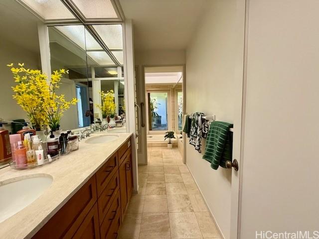 bathroom featuring vanity and tile patterned floors