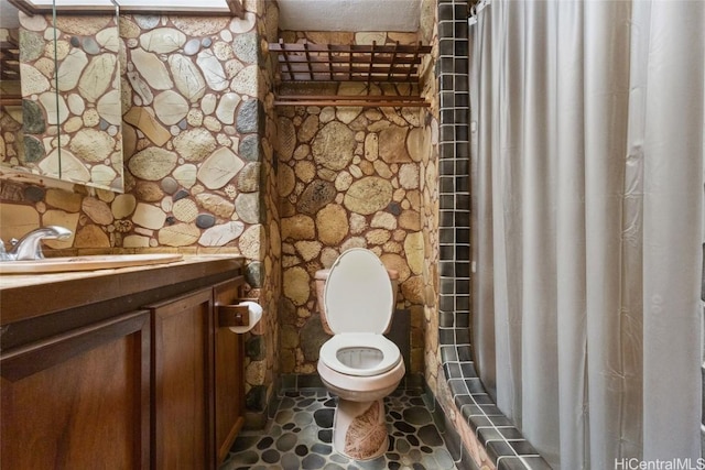 bathroom with sink and toilet