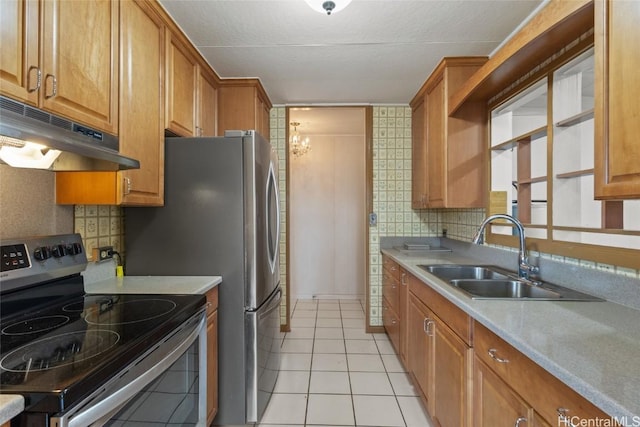 kitchen featuring tasteful backsplash, stainless steel electric stove, sink, and light tile patterned floors