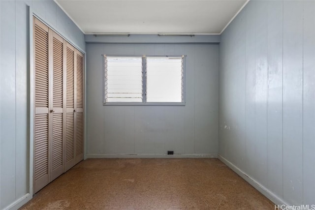 unfurnished bedroom featuring a closet