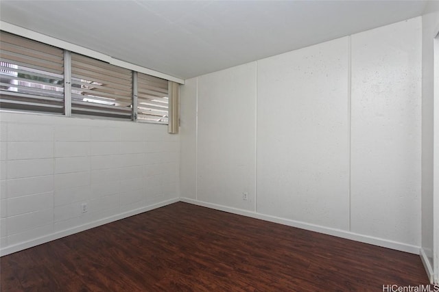 unfurnished room featuring wood-type flooring